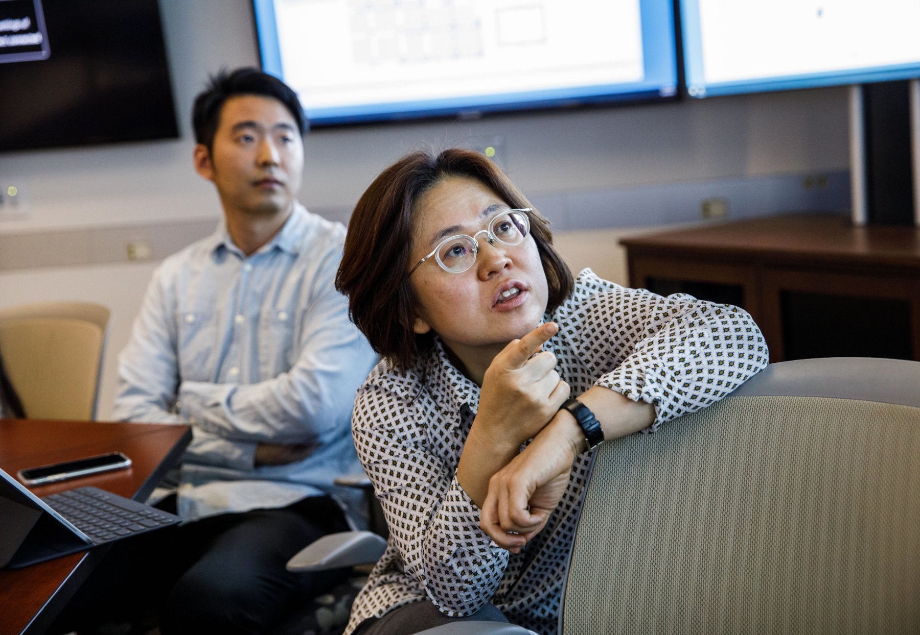 Yushim Kim in a research discussion